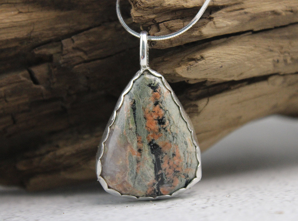 Handmade Triangular Stone Pendant Necklace | Chatham County, NC | Unique Green, Black, and Orangey Red Design